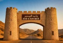 Bab-e-Khyber stone gateway in Jamrud at the entrance of the Khyber Pass with mountains in the background
