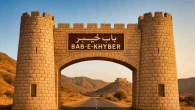 Bab-e-Khyber stone gateway in Jamrud at the entrance of the Khyber Pass with mountains in the background