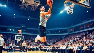 Basketball player dunking the ball in a modern indoor court with bright lights and cheering fans.