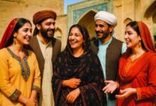 A group of Pakistani men and women in traditional clothing from different regions, smiling and talking together in a cultural setting, symbolizing Pakistan’s linguistic and cultural diversity. spoken in Pakistan