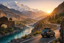 Karakoram mountains at sunrise with turquoise river, scenic road trip, Mughal-style arch and truck art symbolizing Pakistan travel 2026