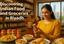 A modern Indian grocery store in Riyadh with shelves full of spices, rice, lentils, and packaged Indian foods, with plated Indian dishes like biryani and curry in the foreground.
