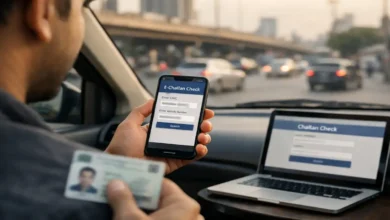 Driver in Karachi checking e-challan online on a smartphone using CNIC and vehicle number.