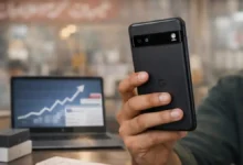 Pakistani buyer comparing a Pixel style smartphone in a mobile market with a rising search trend graph on a laptop, representing Pixel 10a hype in Pakistan