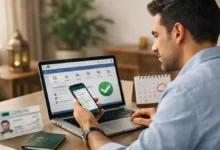 Expat in Saudi Arabia checking Iqama renewal details on Absher using a smartphone and laptop at a desk